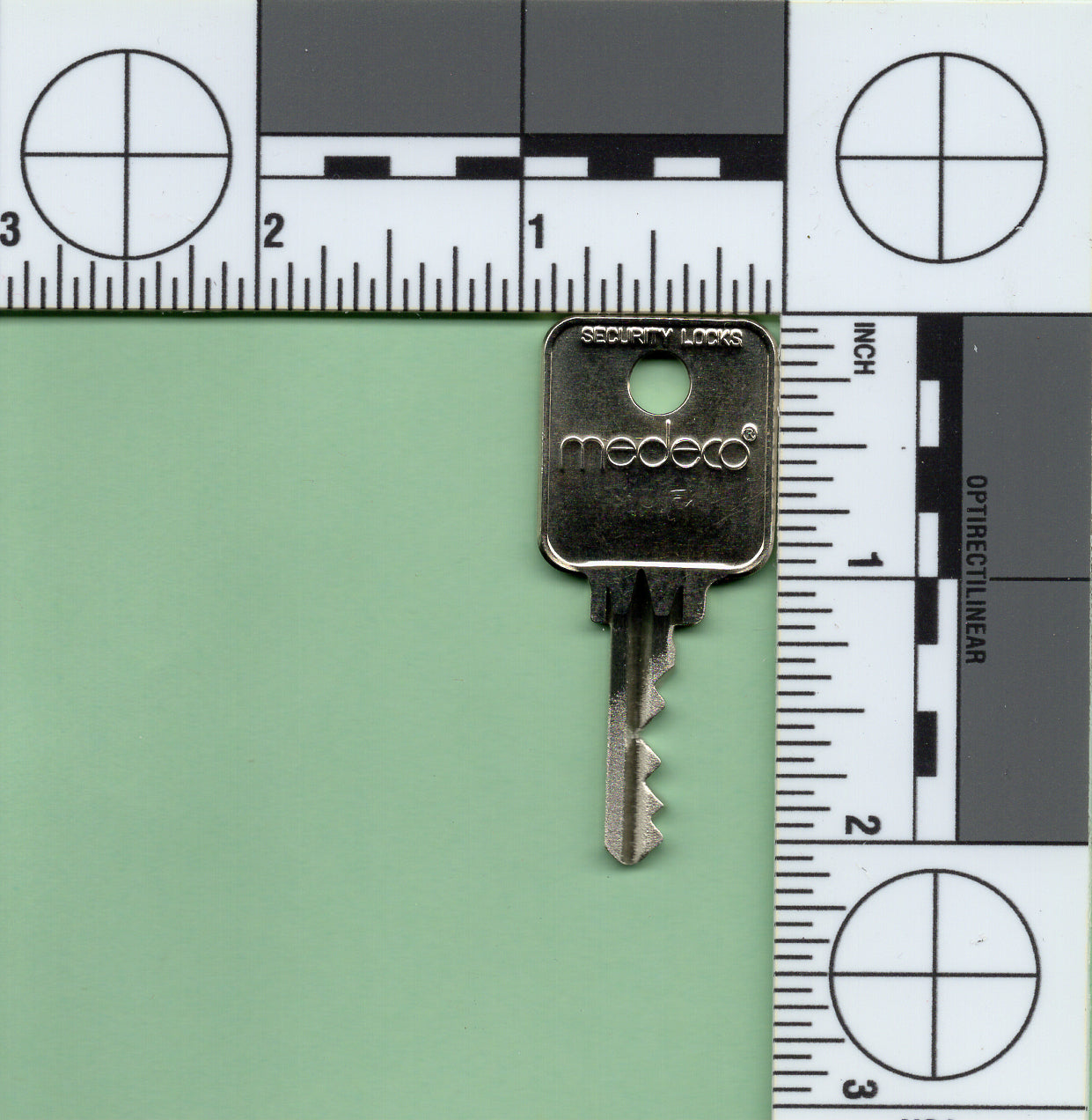 Aviation locksmith services: Keys & Cores can assist with specialized airplane security key needs.Close-up of an airplane key, showcasing the intricate design often found in aviation security keys.